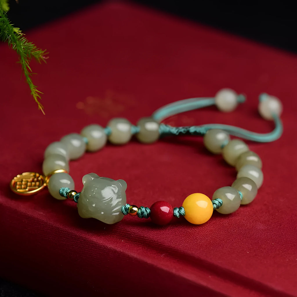 Natural Hetian Jade bracelet with cinnabar beads, beeswax elements and animal zodiac modelling