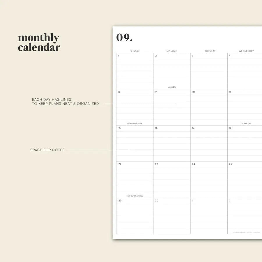 Cherry red daily schedule coil notebook open to show monthly planner pages and wire-o spiral binding
