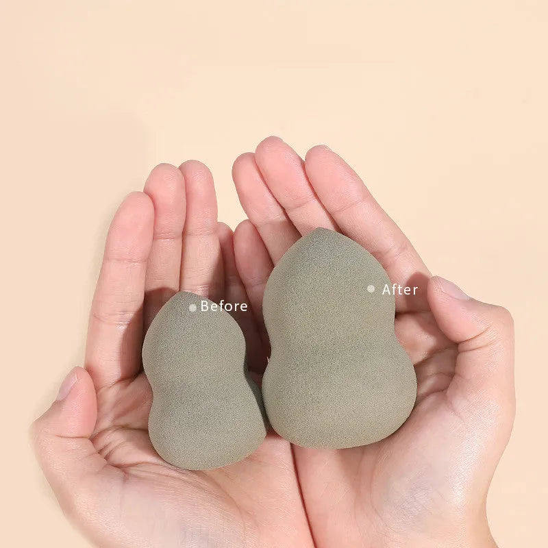 Four Hydrophilic Polyurethane beauty eggs in assorted colours on a metal stand, size 6x4cm each