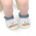 Black and white Velcro toddler shoes with low tube height design for babies 0-18 months
