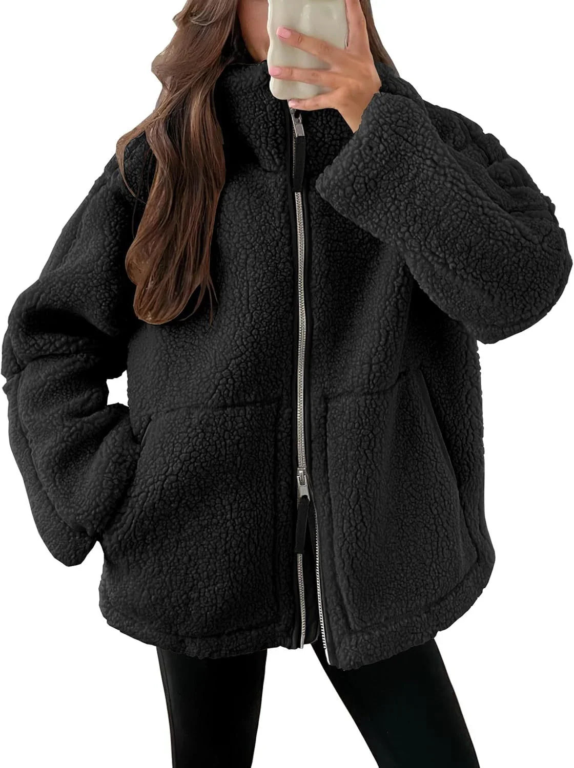 A versatile fleece jacket with a stylish lapel design, practical side pockets, and a cozy long-sleeve silhouette for cold-weather wear.