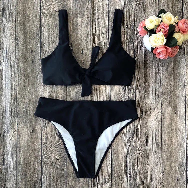Women's polyester bikini set in black, pink, red, white or wine red with matching bra and panties