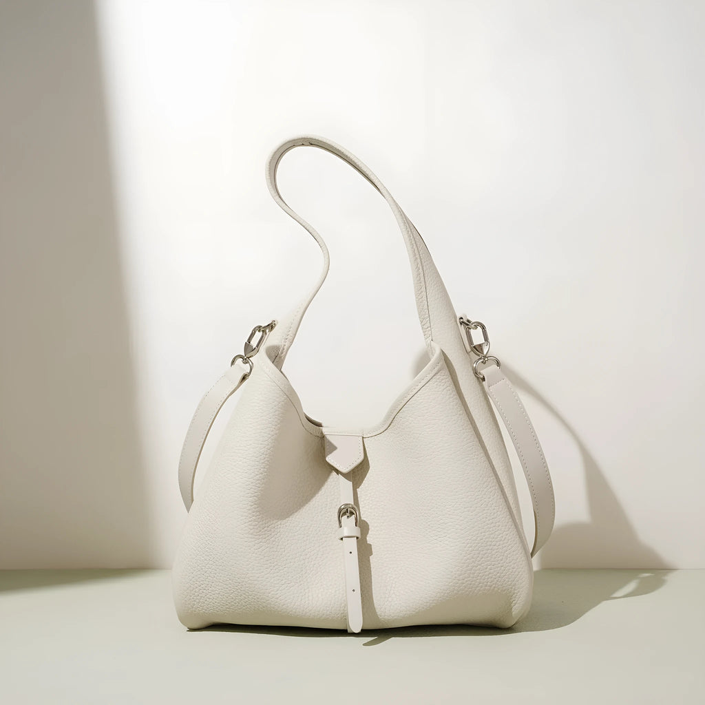 Fashion minimalist single shoulder crossbody handbag in genuine leather, bucket shape, milkshake white colour