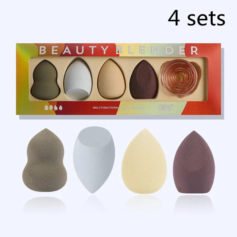 Four Hydrophilic Polyurethane beauty eggs in assorted colours on a metal stand, size 6x4cm each