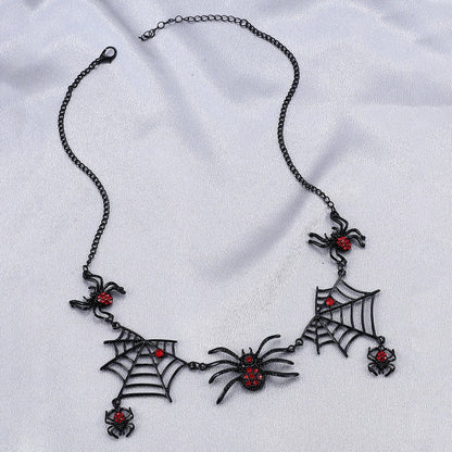 A close-up of a necklace featuring an intricate spider web design, made of high-quality alloy with a polished finish.