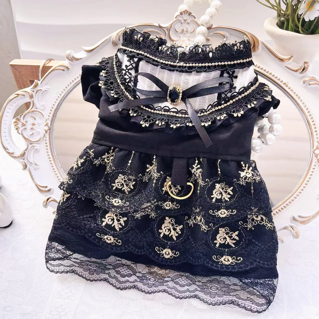 Golden gothic princess skirt costume for a small dog on a white background.