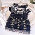 Golden gothic princess skirt costume for a small dog on a white background.