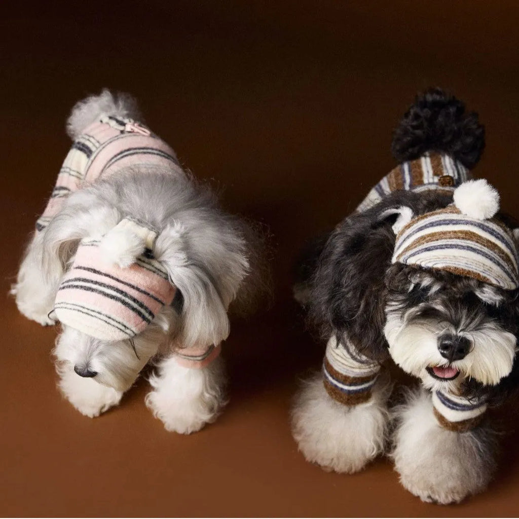 Striped fur ball acrylic dog hat in pink and coffee colours on display showing side view