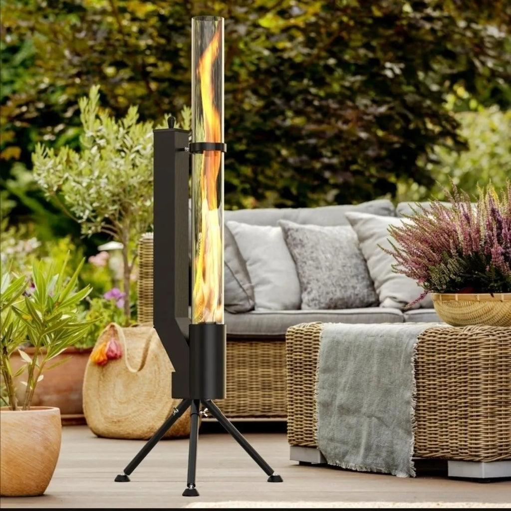 Vertical iron wood burning rocket furnace stove for outdoor courtyard heating.