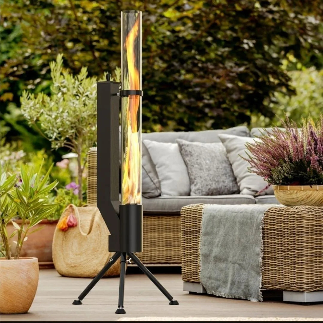 Vertical iron wood burning rocket furnace stove for outdoor courtyard heating.