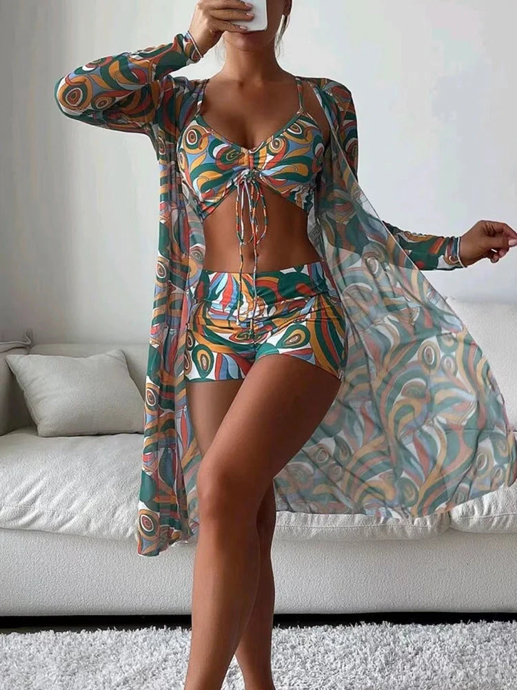 3-piece Pring bikini set with long sleeve cardigan in floral pattern for summer beach outings