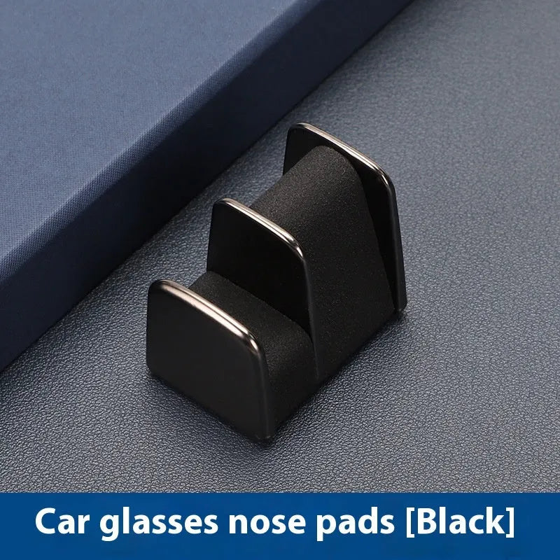 Car dashboard sunglasses holder clip in zinc alloy with leather elements measuring 3.7cm