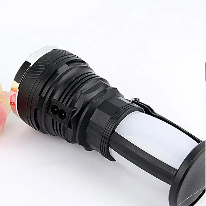 Black solar-powered LED emergency torch with USB charging port