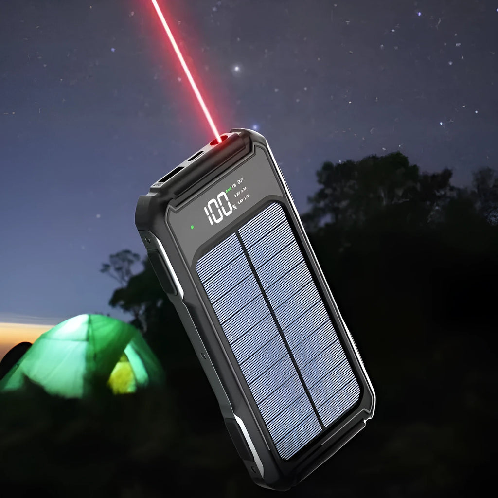 Black, green, and orange coloured large capacity military-grade mobile power bank showing size scale.