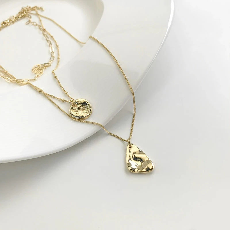 Multi-layer unisex clavicle chain with geometric triangle pendant and snake bones chain