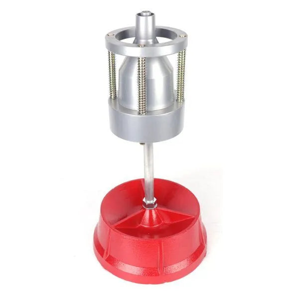 Portable aluminium hub wheel balancer with bull's eye level on enamel base.