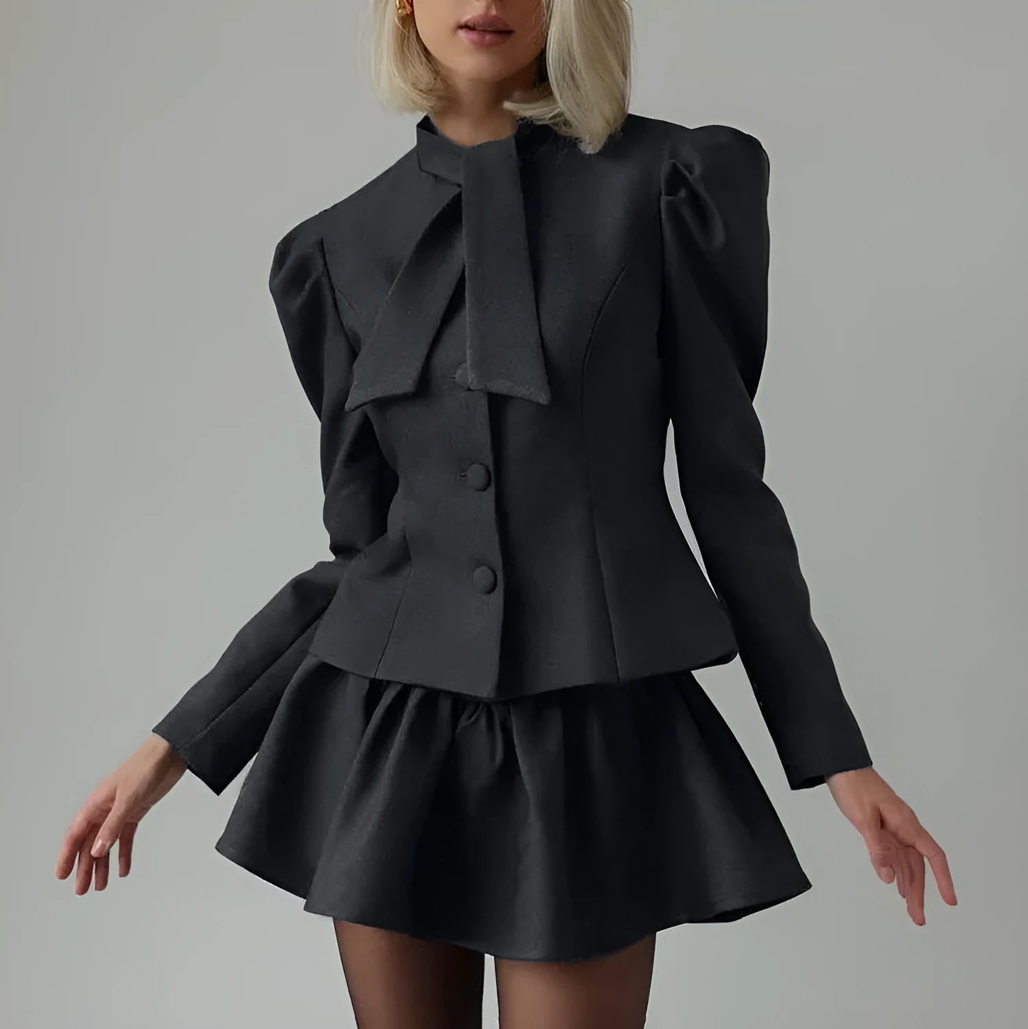 Women's gray bow tie long sleeve suit top and short skirt two-piece set on model