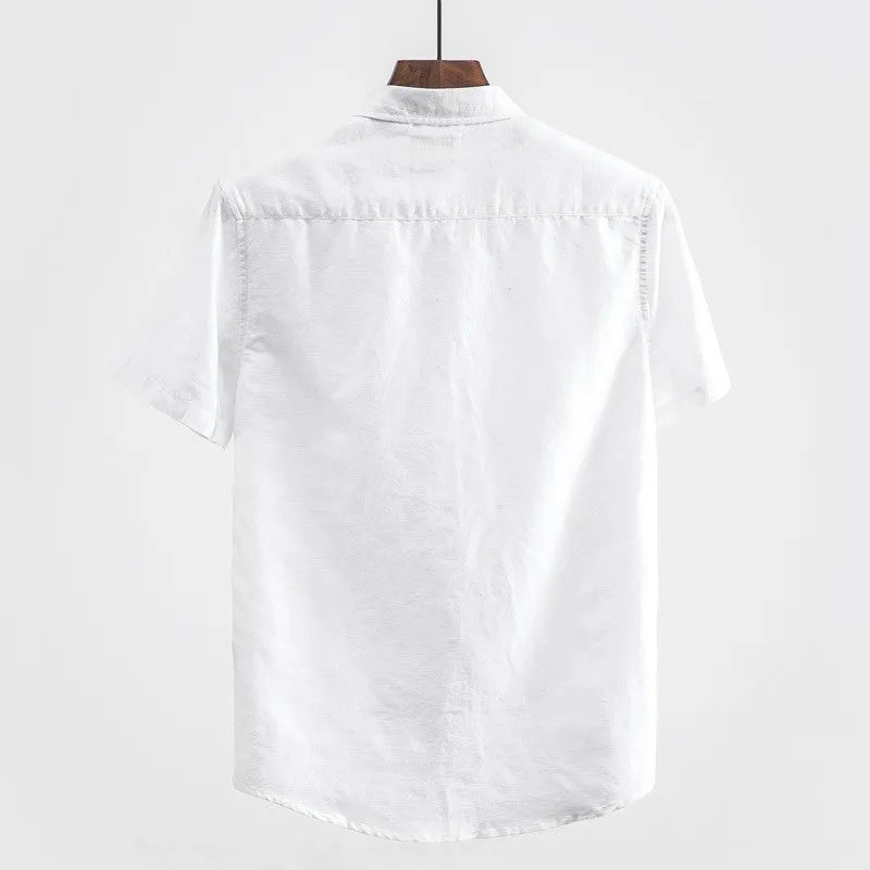 Men's loose fit linen short sleeve shirt with a square collar in sapphire blue.
