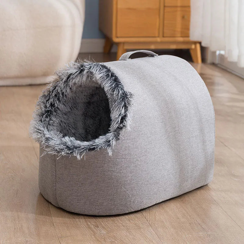 Grey fleece-lined closed cat sleeping bag bed shown next to a coffee-coloured one.