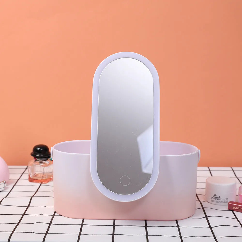 Pink gradient LED makeup mirror open showing storage compartment and USB charging port