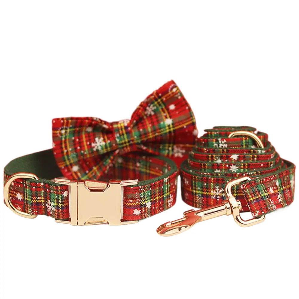Green snowflake Christmas dog collar set with matching leash, bow tie, and dog vest for holiday pet outfits