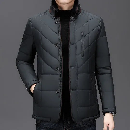 Men's solid colour winter coat with cotton padding and side pockets in dark blue