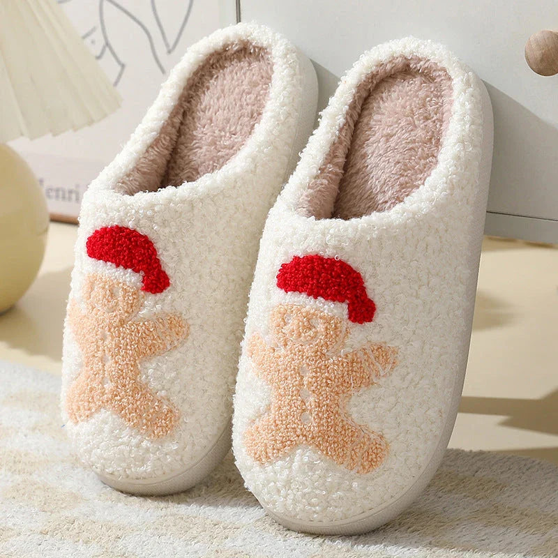 Cozy Christmas home slippers with festive designs, including Santa Claus, Moose, and Gingerbread Man patterns