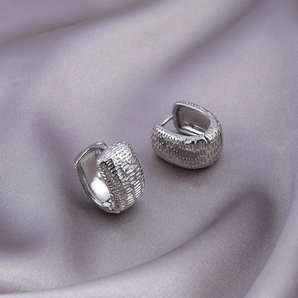 Micro zircon stud earrings with woven twisted gold design real gold plating on copper geometric shape