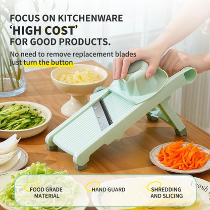 Adjustable vegetable slicer with stainless steel blade in mint green
