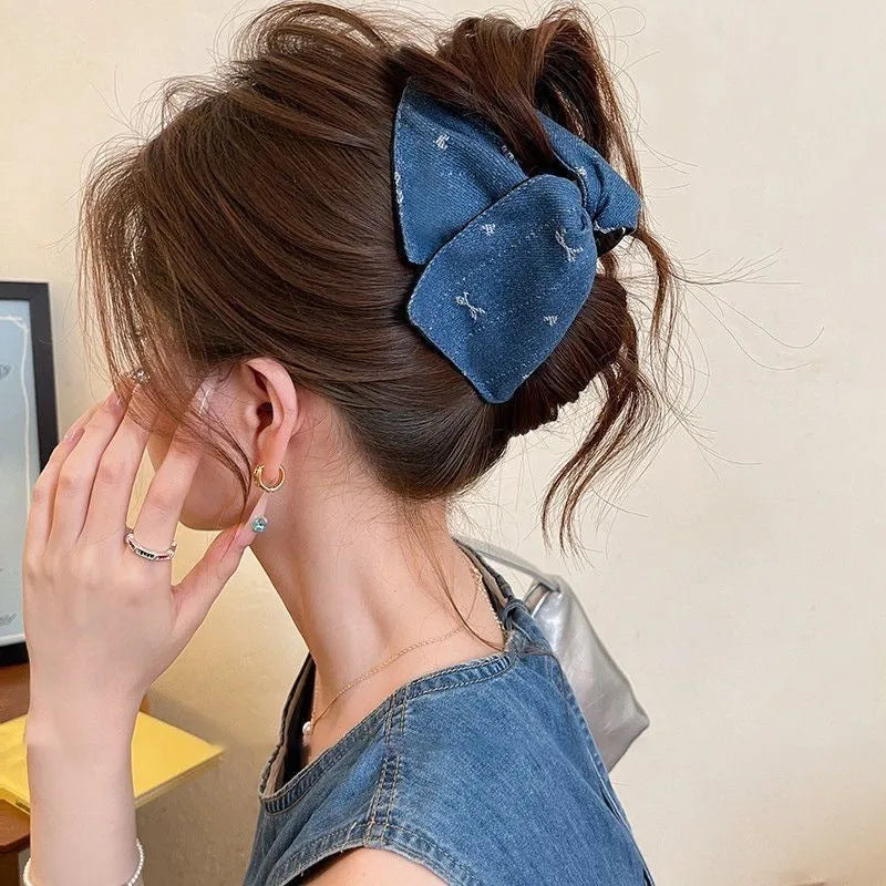 Handmade denim fabric bow hair clip with acrylic triangle decoration and plastic grip