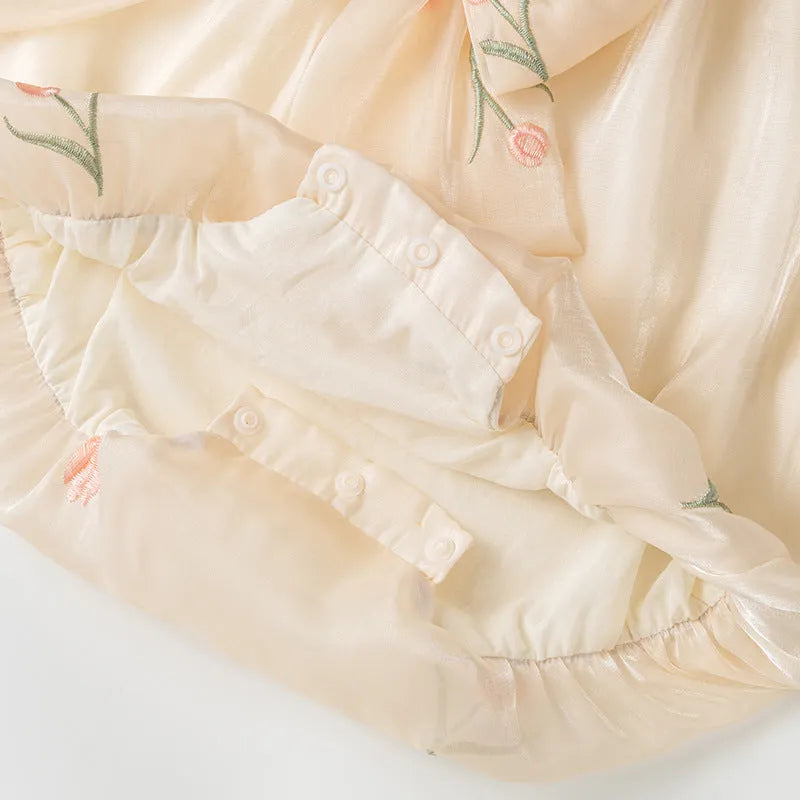 Baby girl thin polyester triangle jumpsuit in apricot colour, sleeveless pullover style
