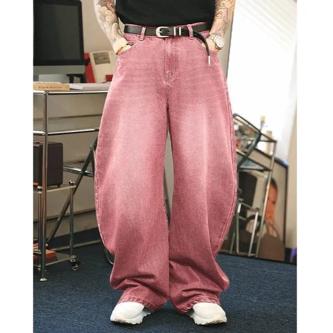 Men's brown washed loose flared jeans with low waist and zipper fly, side view