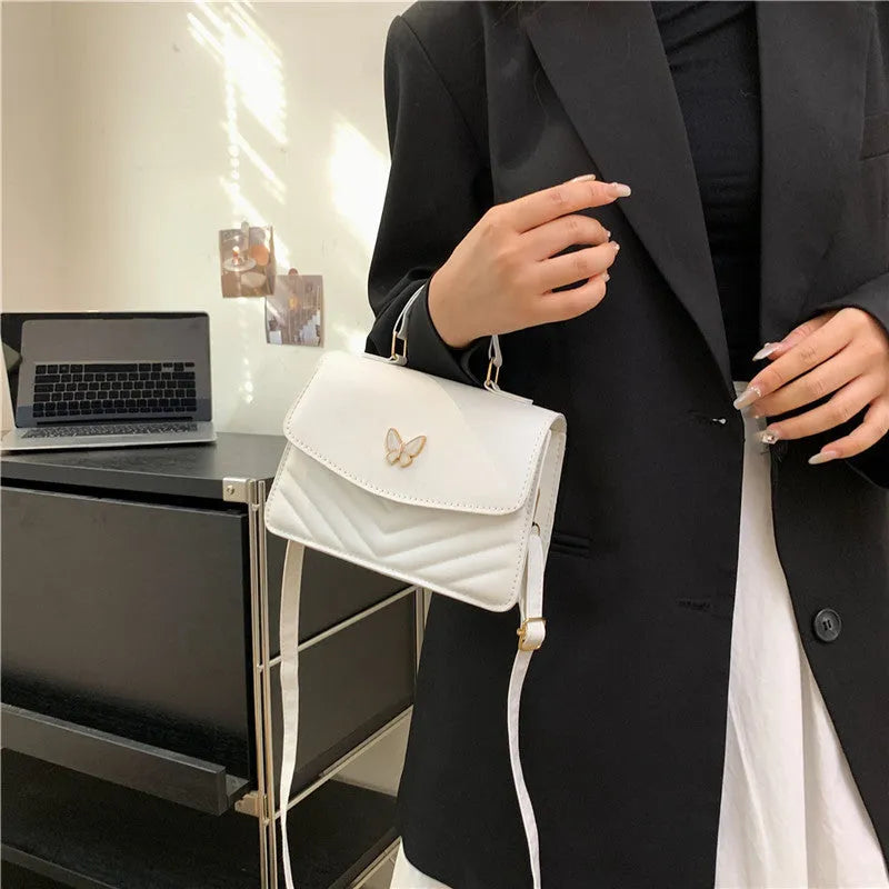 Women's PU horizontal square handbag with bow detail in dark blue colour option