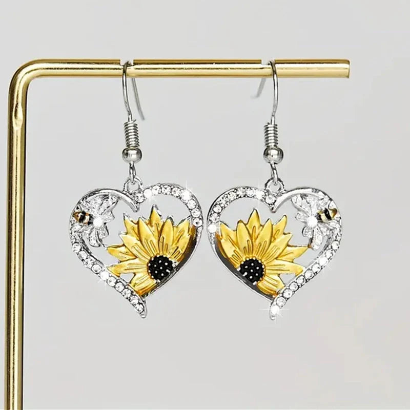 Silver alloy fashion earrings with bee and sunflower heart designs