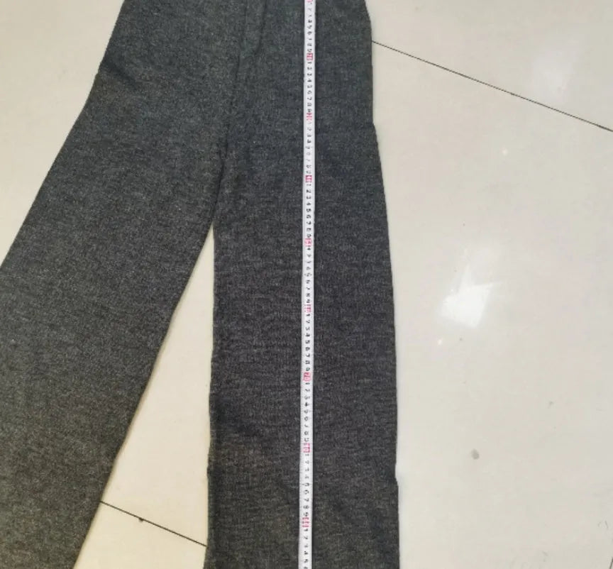 Women's dark grey acrylic knit suit set with side-slit sweater and trousers