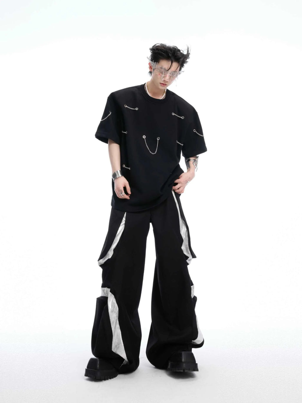 Black heavy cotton t-shirt with padded chain shoulder detail on short sleeves