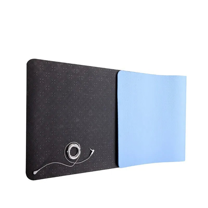Blue conductive yoga mat with plants pattern, 182cm long, showing integrated grounding wire on non-slip PU surface.