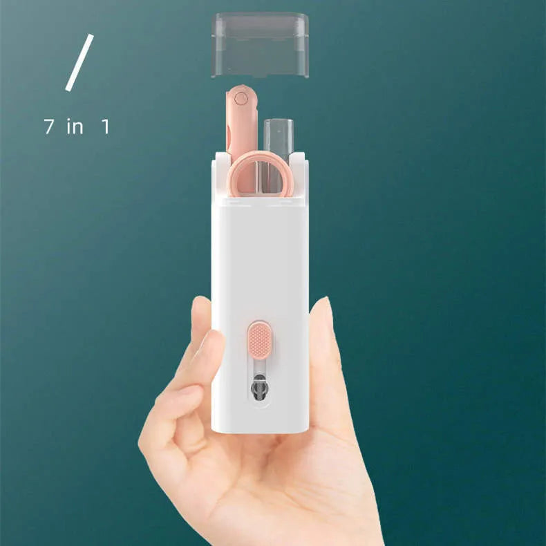 Multifunctional electronics cleaning kit with cleaning pen, brush, key puller, and spray bottle on a white background