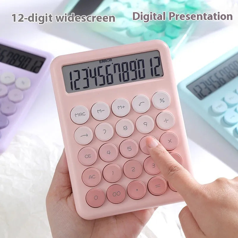 Desktop calculator with gradient colour finish in violet, blue, mint, or pink on a desk.