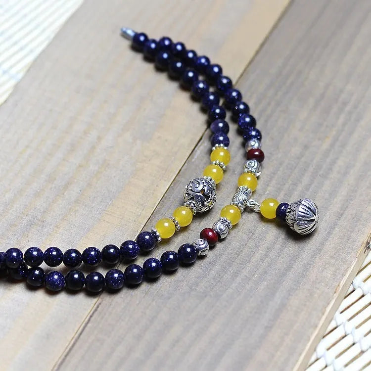 Blue San beads ethnic bracelet showing manual bead construction and circular wrapping design