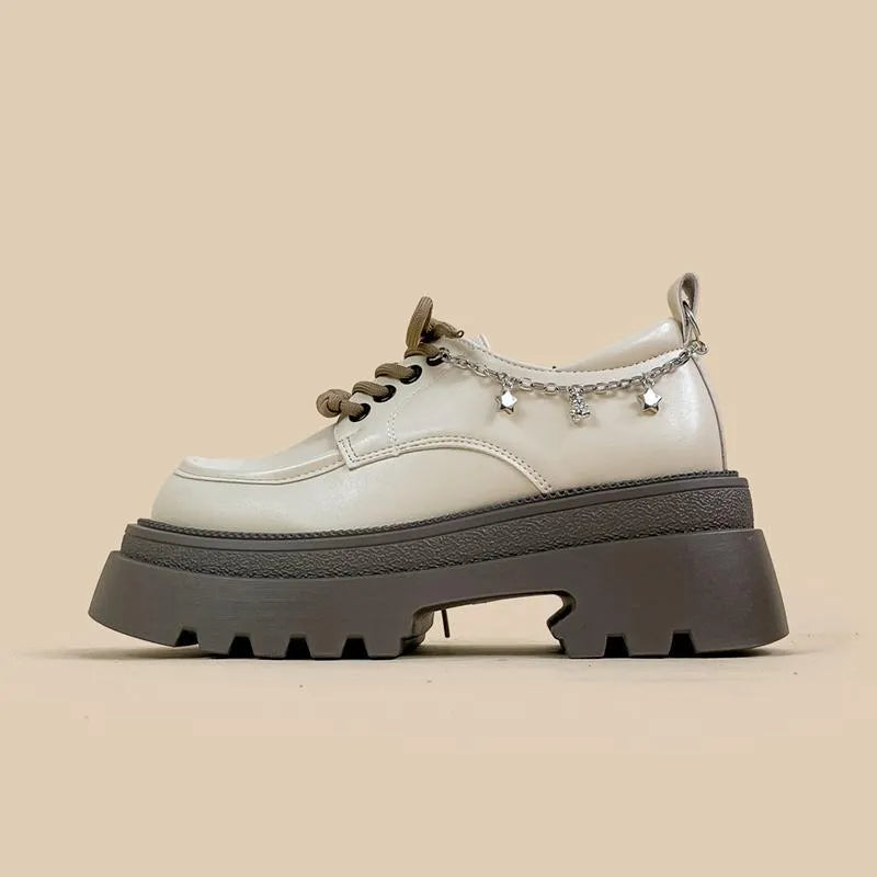 White XINGX Bear colour platform Mary Jane shoes with thick chunky heel and front lace-up.