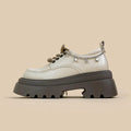 White XINGX Bear colour platform Mary Jane shoes with thick chunky heel and front lace-up.