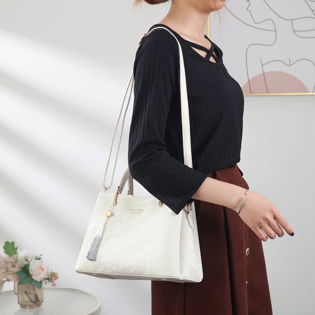 Women's PU leather shoulder bag with square shape and ethnic pattern in four colours