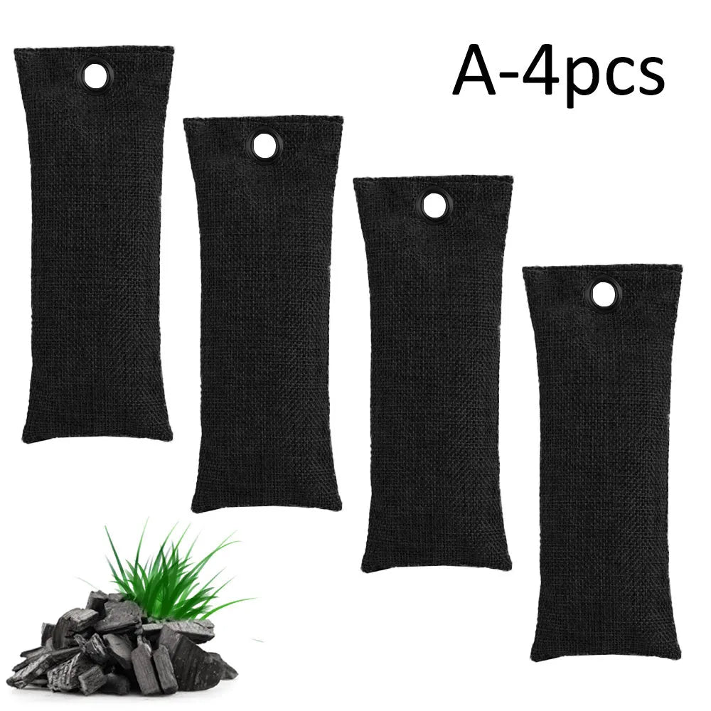 Four bamboo charcoal deodorising bags in black, green, grey and blue colours measuring 16.5cm x 6.5cm