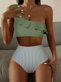 Women's striped and solid colour block bikini swimsuit on a hanger, shown in lavender purple.