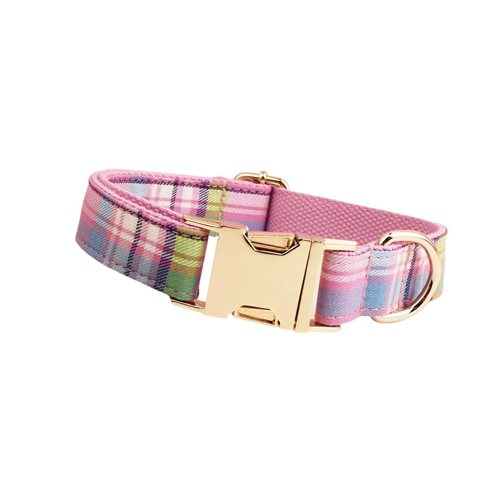 Four-piece dog collar set with matching leash, bow and vest in cloth fabric
