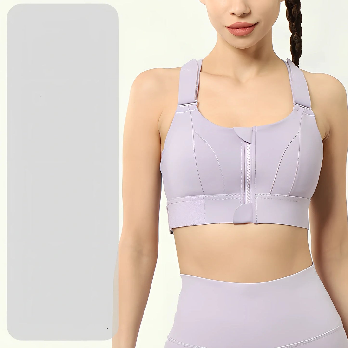 Women's black seamless sports bra with front zipper closure for high-impact workouts