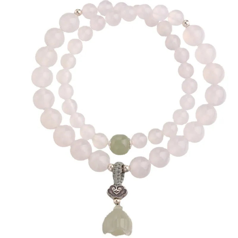 S925 silver bracelet with white agate and Hetian jade stones forming a geometric lotus design.
