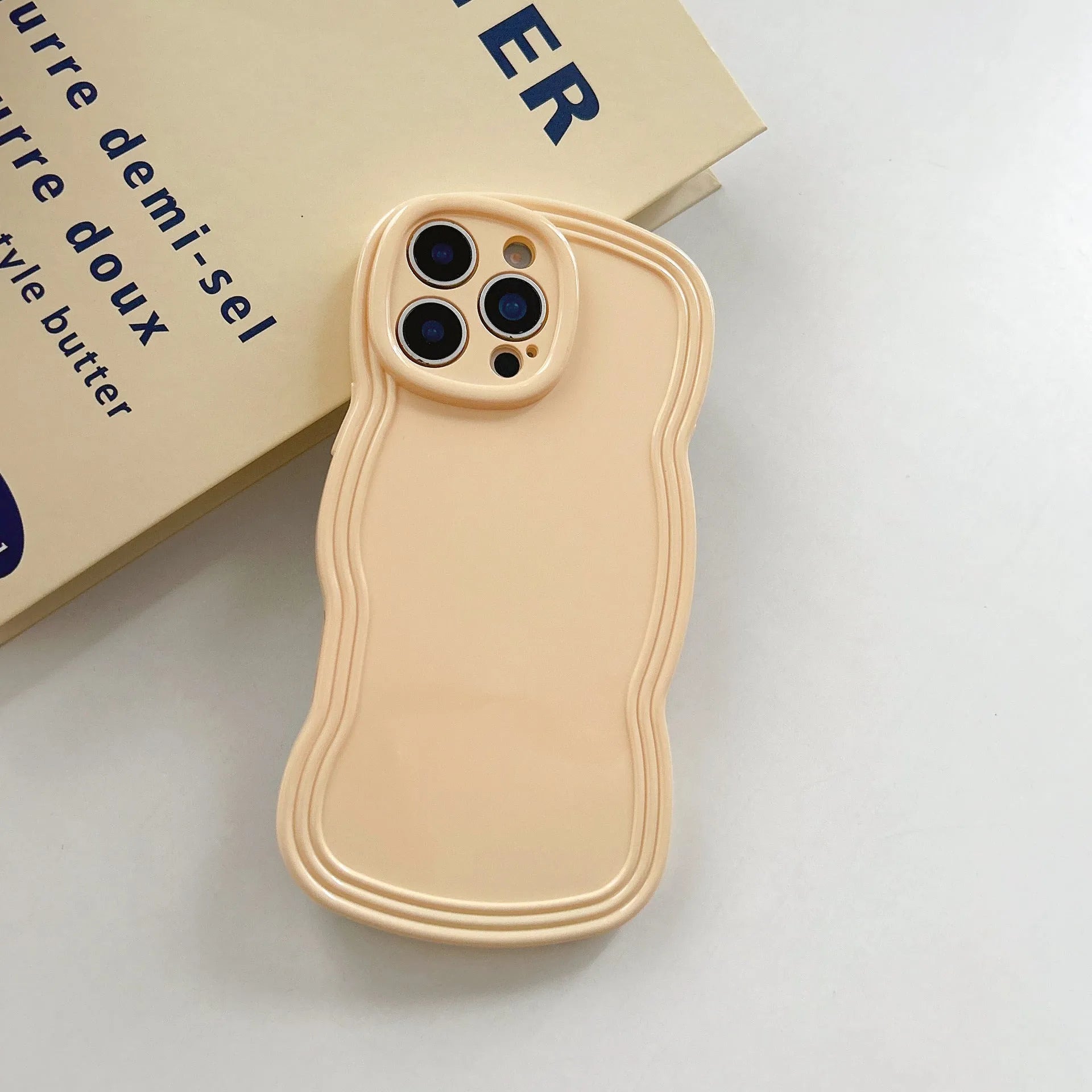 Cream candy colour wave pattern TPU phone case for iPhone, showing anti-fingerprint surface.