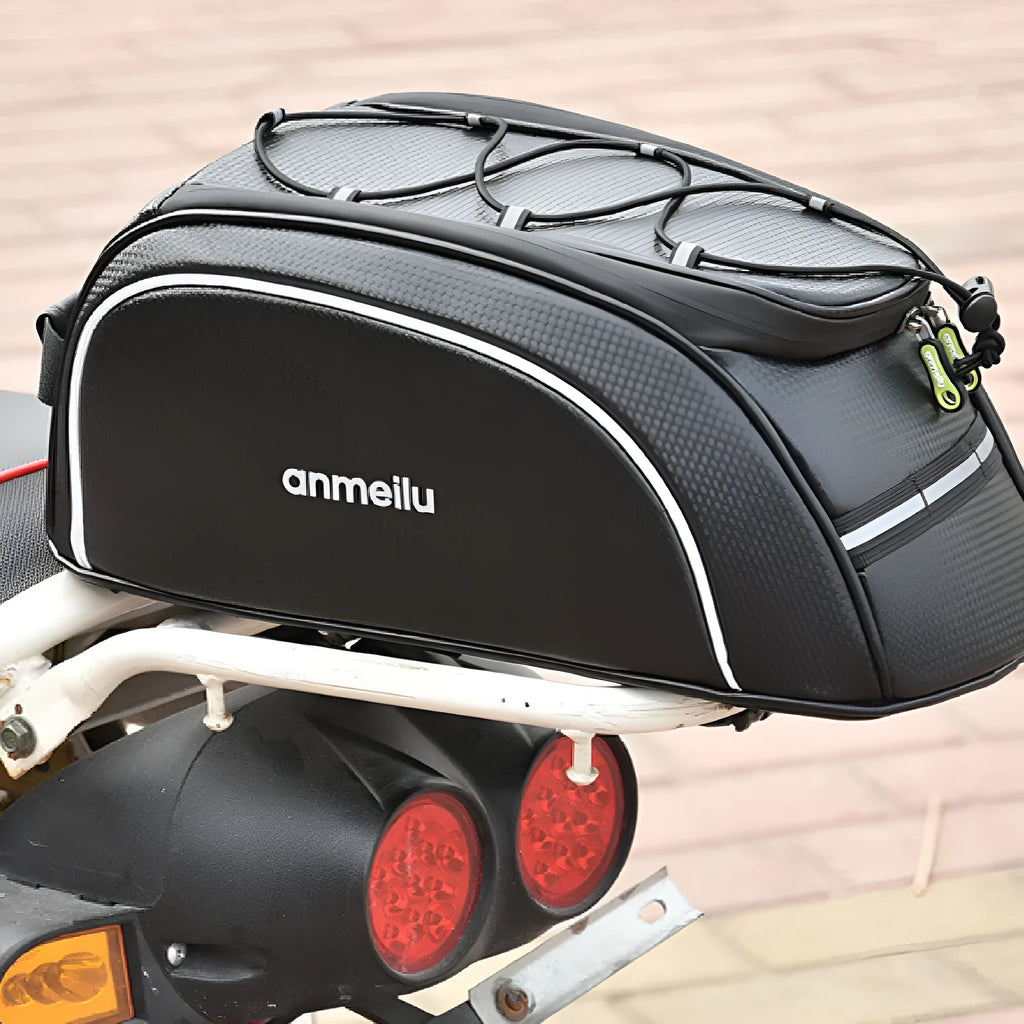 Waterproof black bicycle pannier bag mounted on bike rack with 8 litre capacity